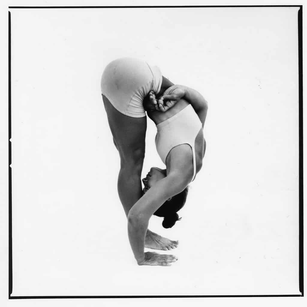 Opale in baddhardha padmottanasana Ashtanga Yoga photo shoot by Jerome Ferriere in Ibiza 2006