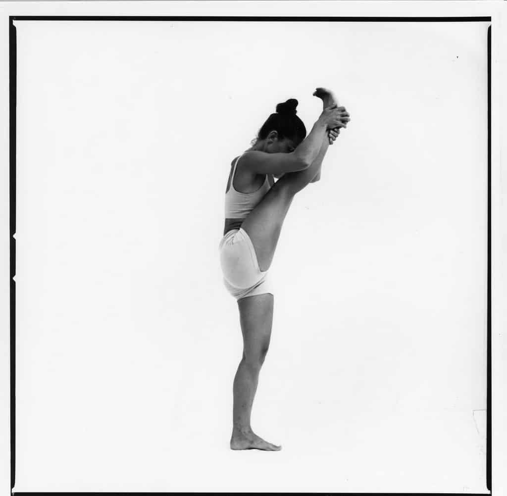 Opale in utthita trivikramasana Ashtanga Yoga photo shoot by Jerome Ferriere in Ibiza 2006